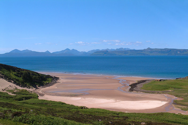 The bay at Sand with Raasay, and the Cuillins of Skye in the background